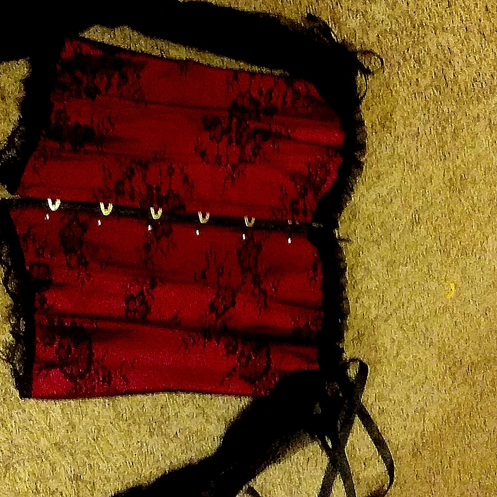 It is a off the shoulder red corset.